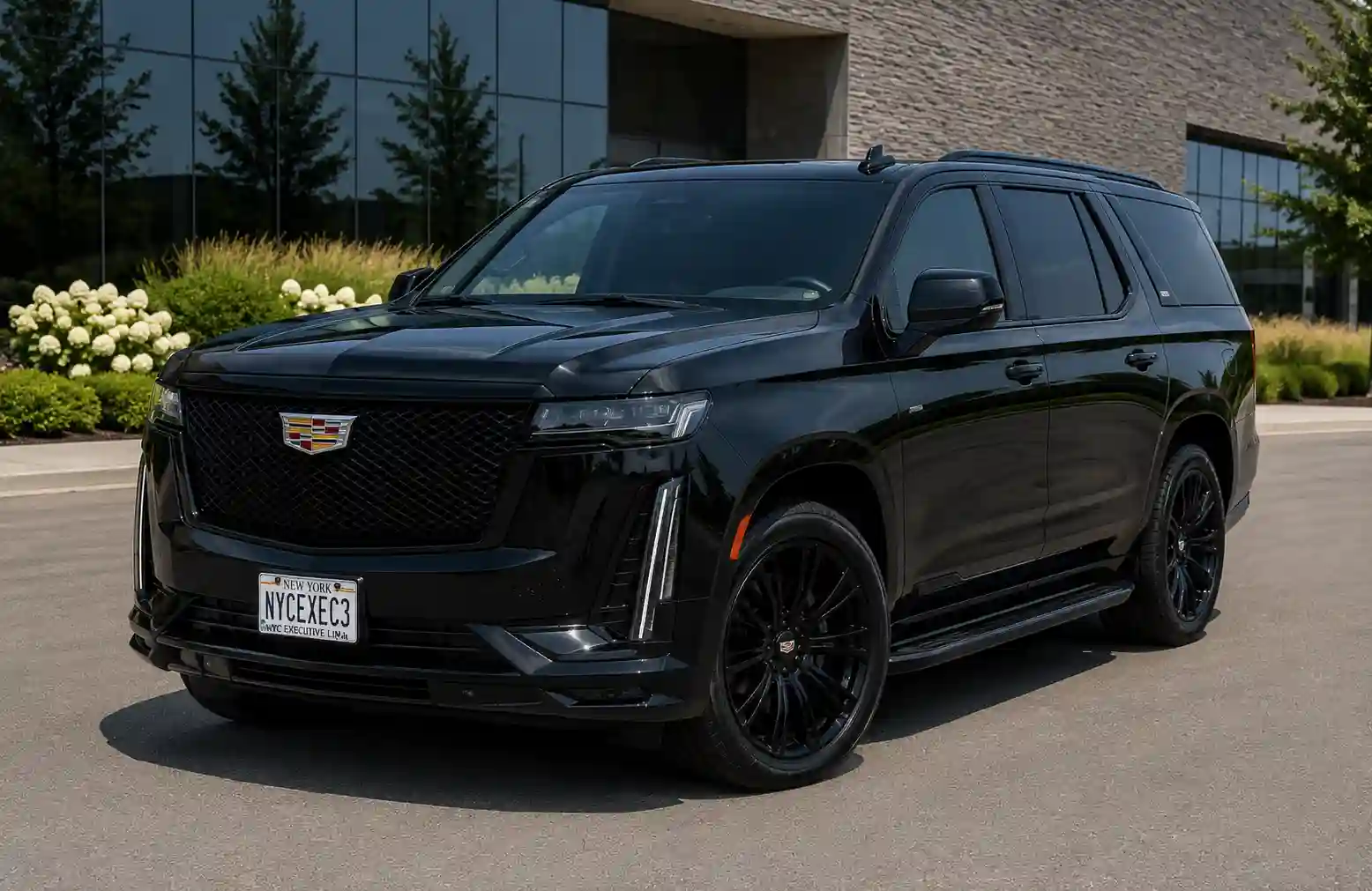 Black Cadillac Escalade SUV with chauffeur in New York