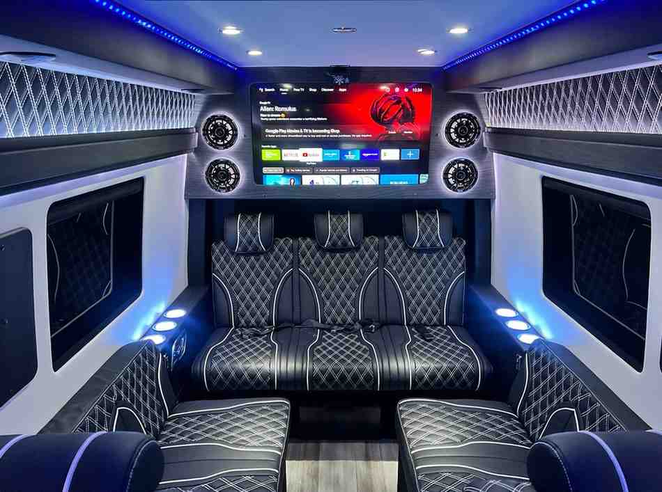 TV and entertainment system inside a Mercedes Sprinter party limo